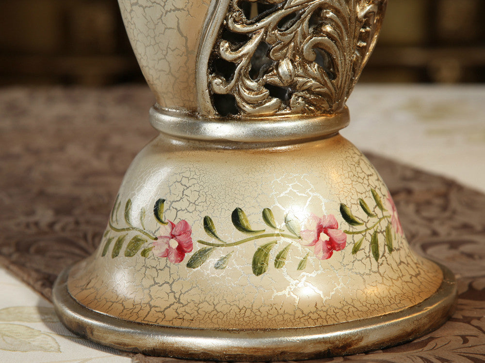 Vintage tall resin vase, twenty-one inches high, hand-painted with flowers.