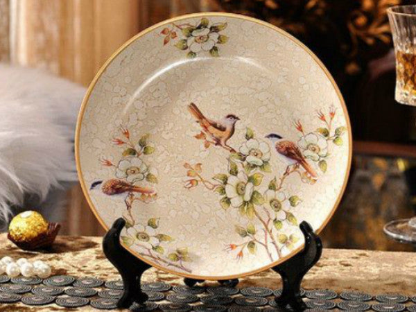 Sunbird Meadow hand-painted ceramic vase set with floral and bird designs.