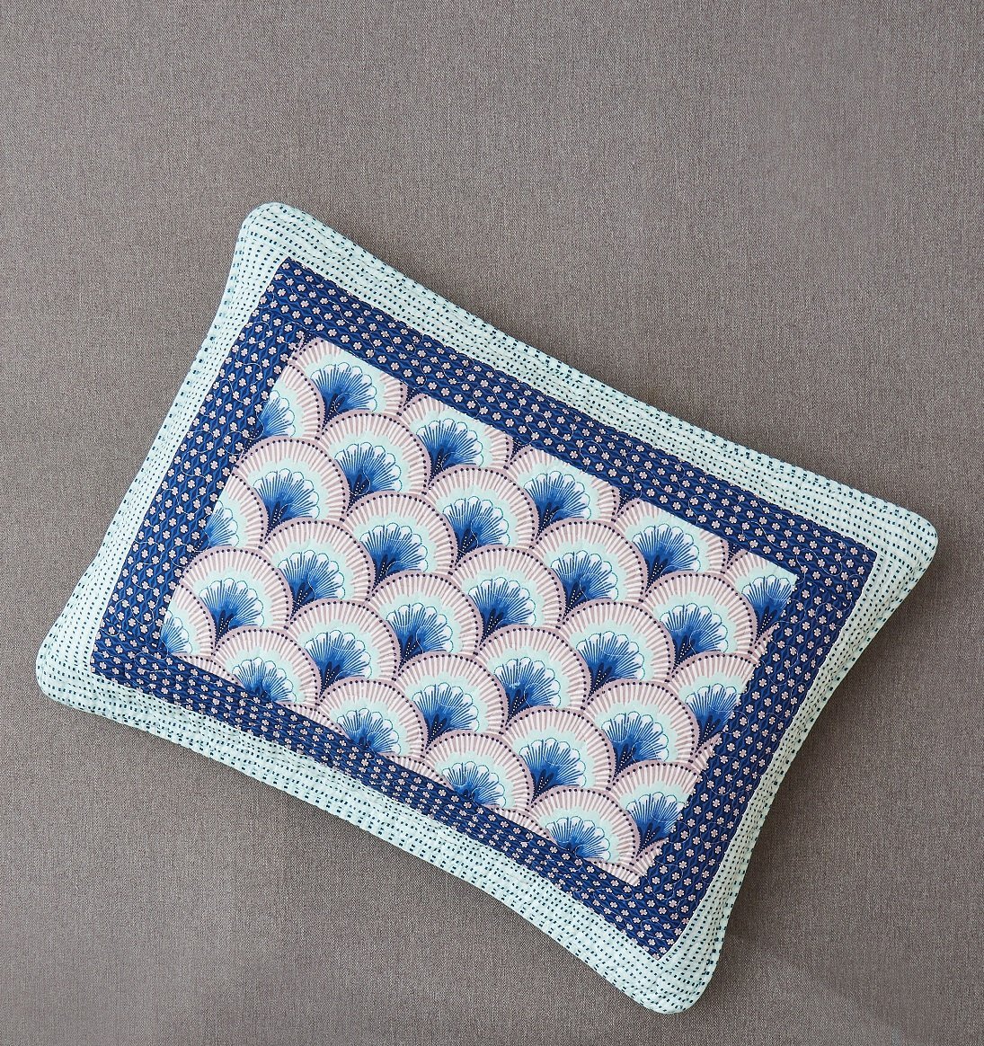 Blue and green Mediterranean patchwork quilted bedspread set.