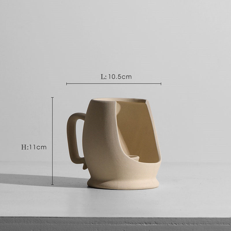 Taupe ceramic vase set with two modern minimalist candle holders.
