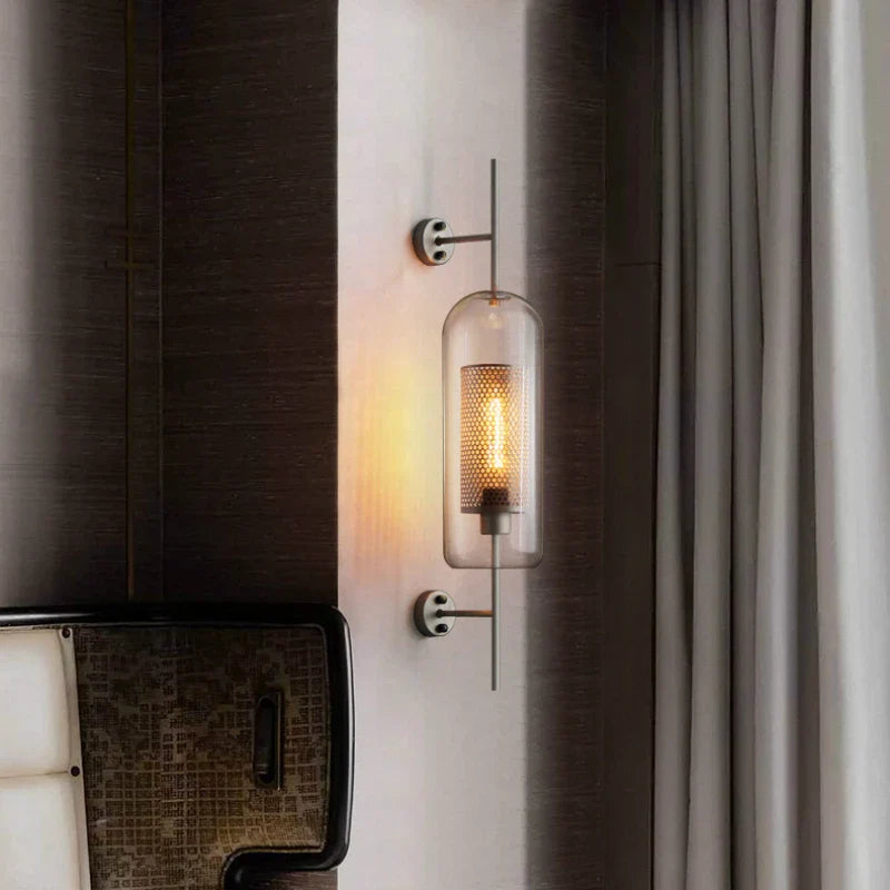 Retro industrial glass ball wall lamp sconce with bronze finish.