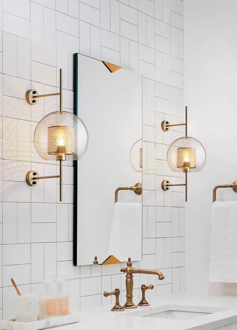 Retro industrial glass ball wall sconce with bronze finish.