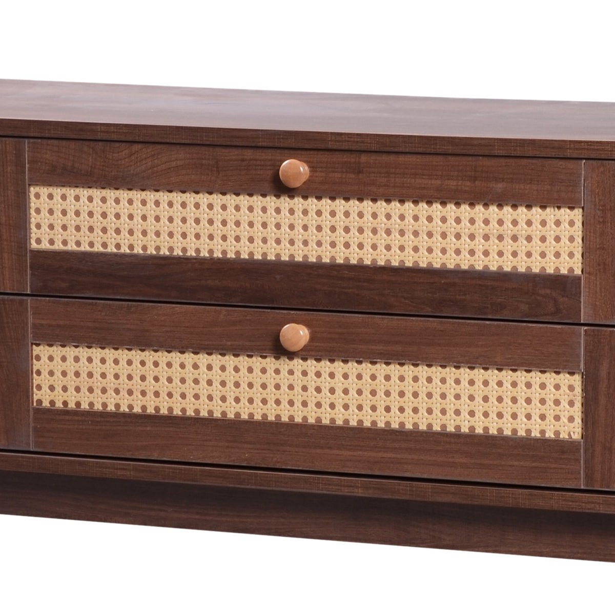 Modern farmhouse rattan TV stand in natural wood tones, holding a large TV.