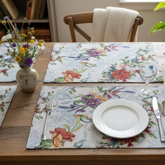 Set of 4 tropical sky blue bird floral tapestry placemats, 13x19 inches.