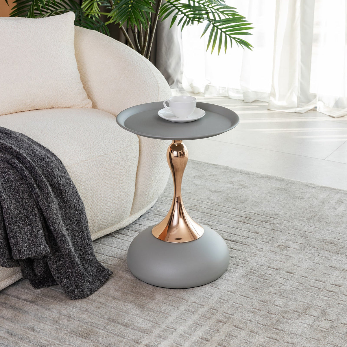 Round coffee table with anti-rust mermaid tail pedestal base.