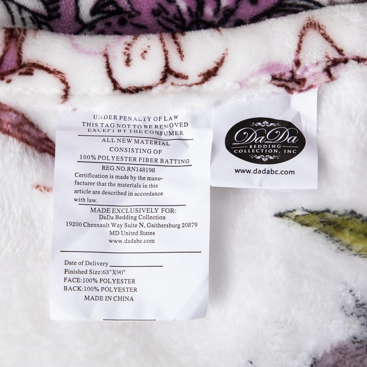 Cozy flannel fleece throw blanket with floral blossoms and spring cottage birds pattern.