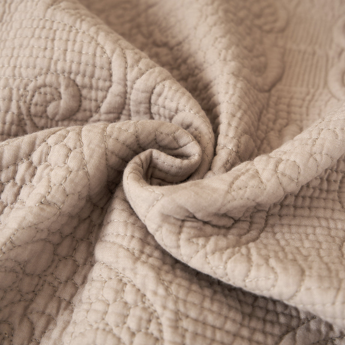 Taupe beige 50x60 quilted throw blanket with elegant paisley pattern and fringe.
