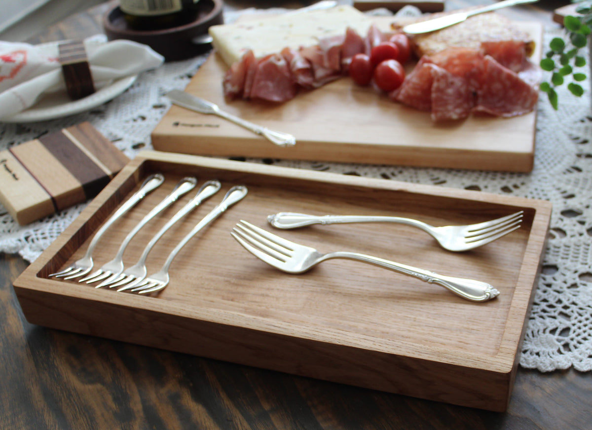 Stylish tray organizing daily essentials on a counter or vanity.