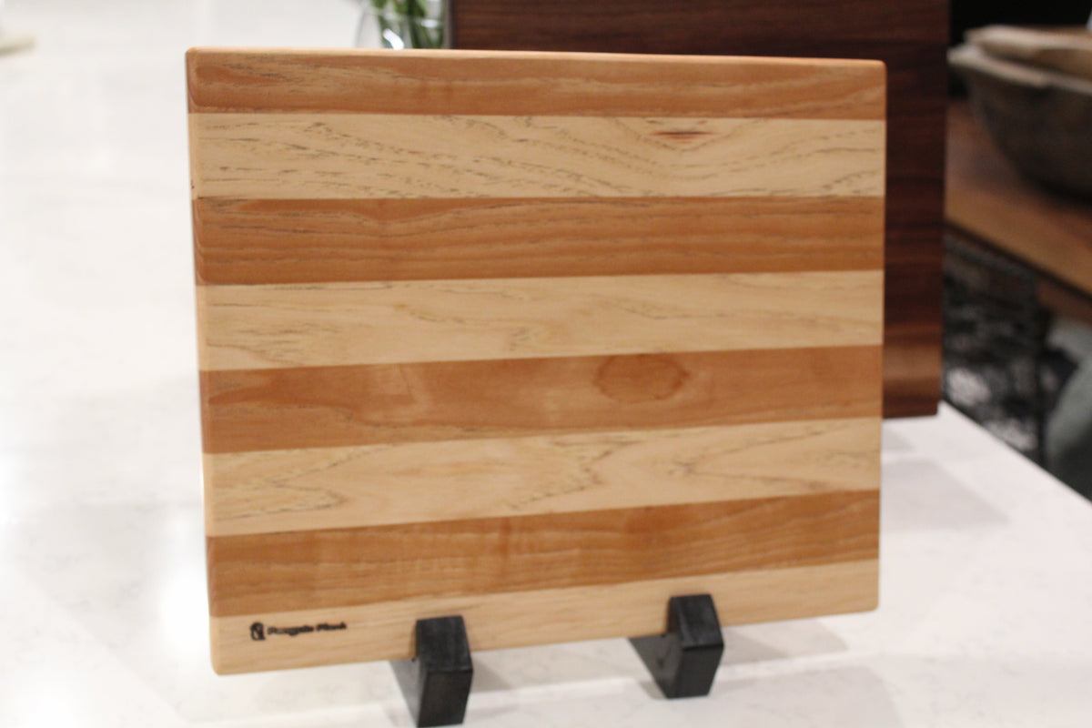 Handcrafted hickory wood cheese board and serving plank for entertaining.