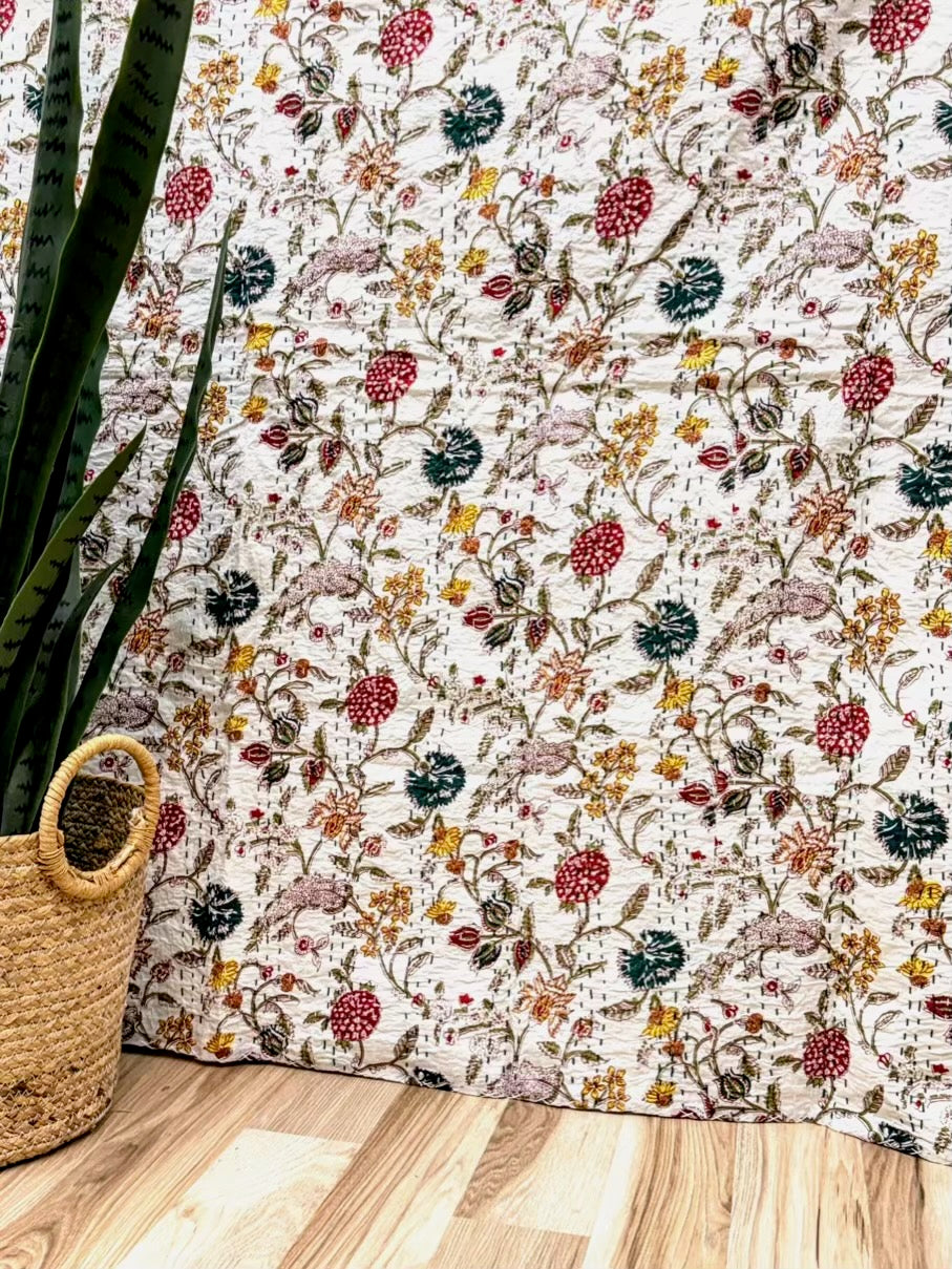 Kantha quilt bedspread with a wildflower field block print on cotton