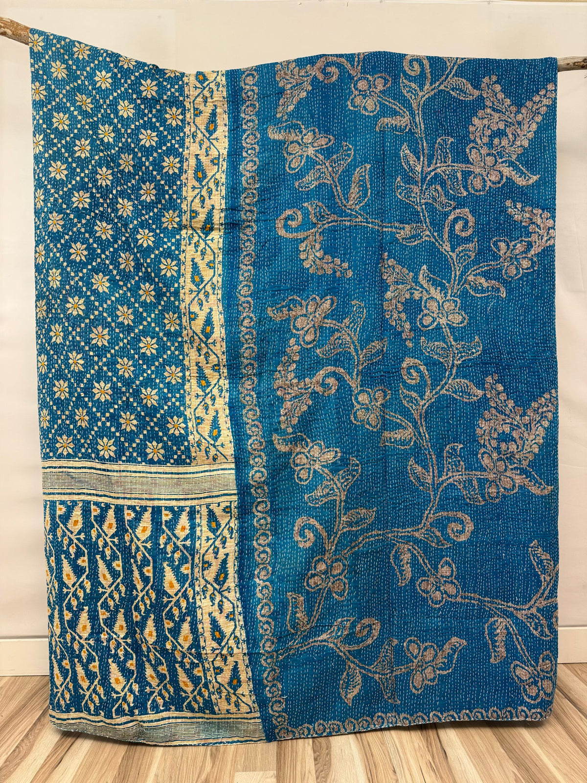 Handmade king size kantha quilt with colorful vintage saree patchwork.