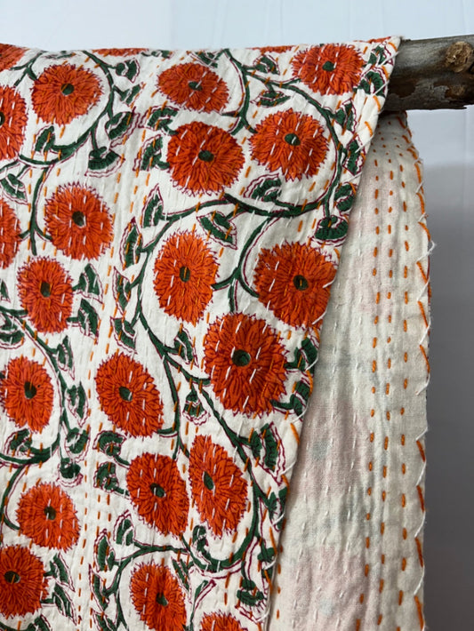 Orange poppies block print Kantha quilt, handmade in Jaipur, India.
