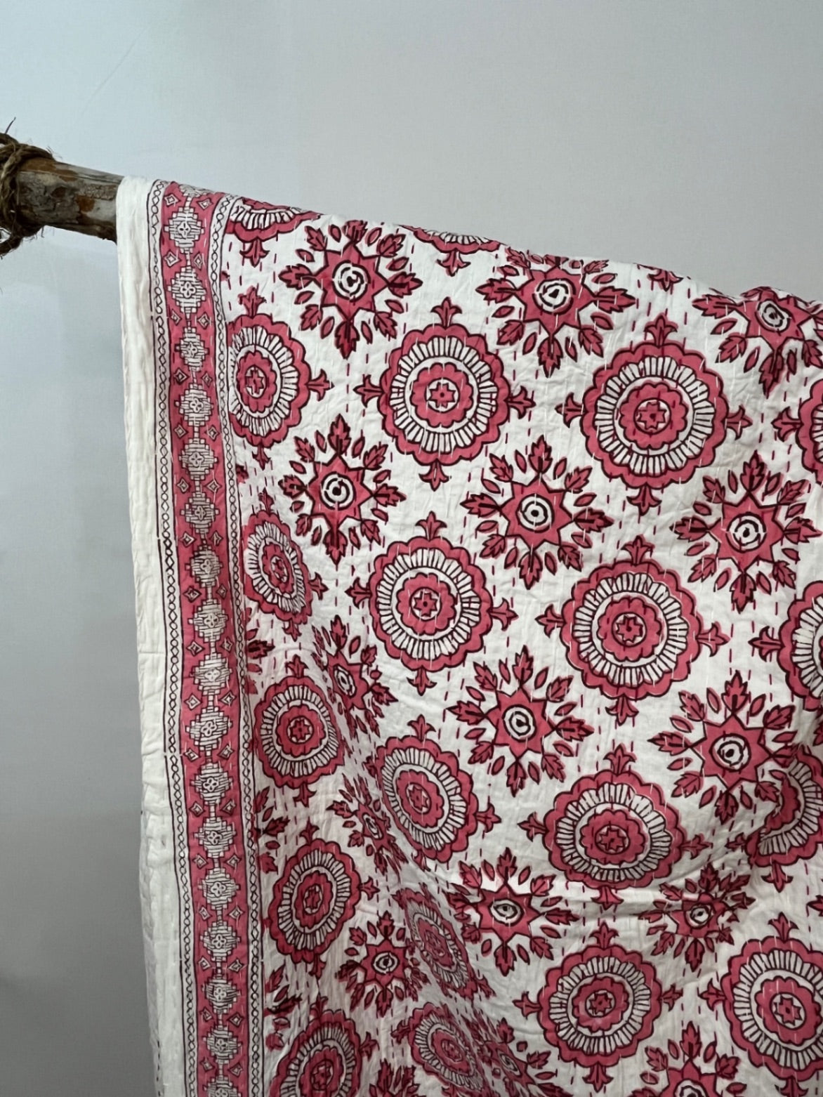 Pink compass block print cotton Kantha quilt, handstitched.