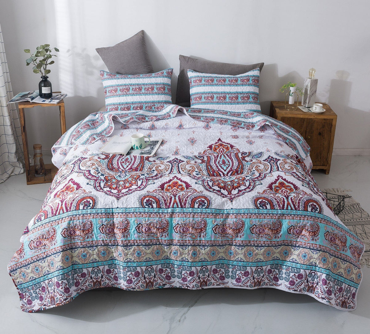 White and blue floral paisley bedspread set with bohemian design.