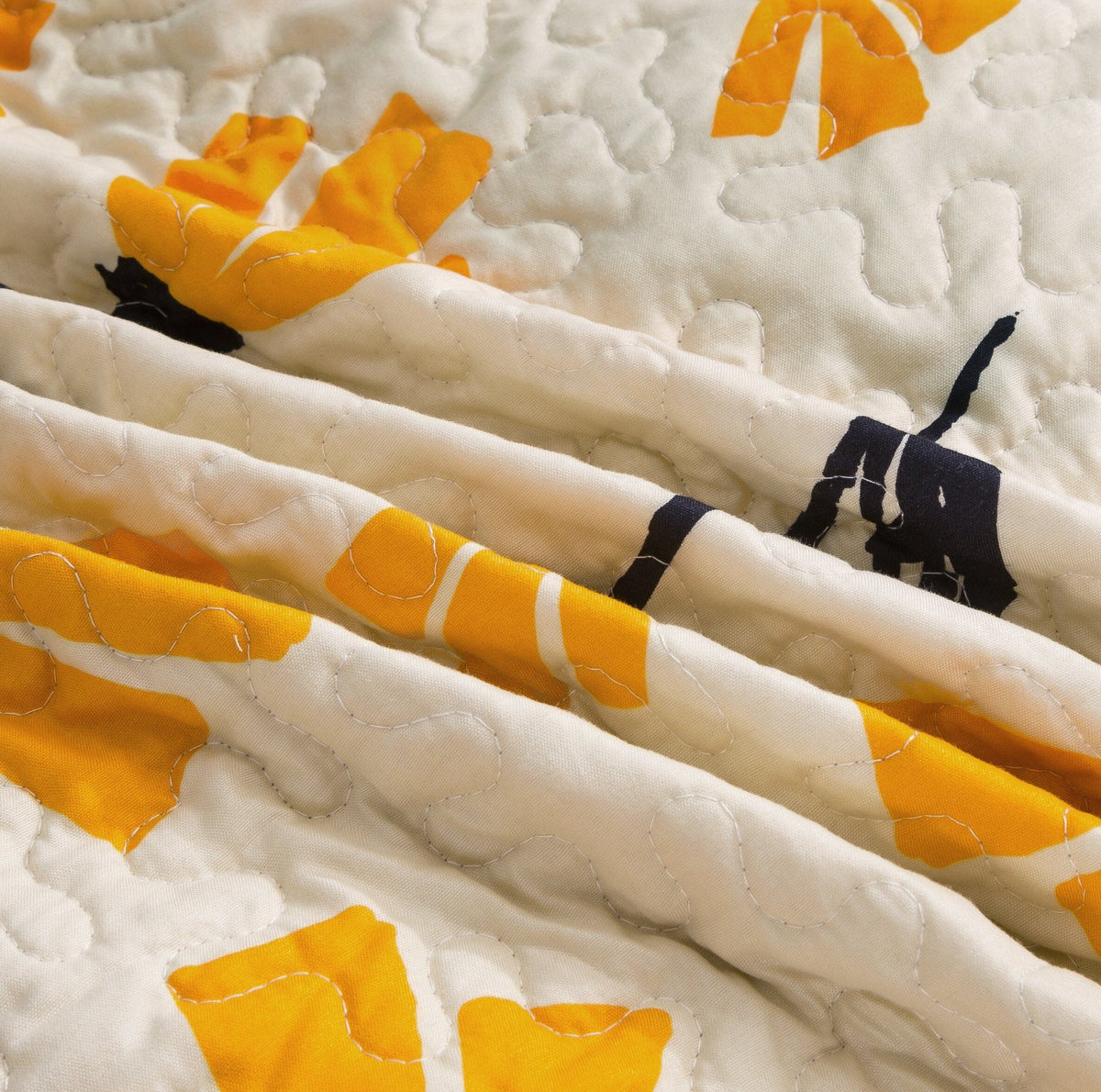 Yellow floral scalloped bedspread set on ivory cream background