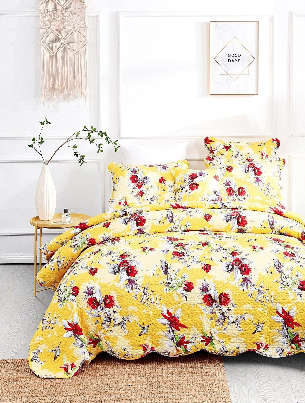 Vibrant yellow hummingbirds and flowers on a scalloped quilted bedspread set.