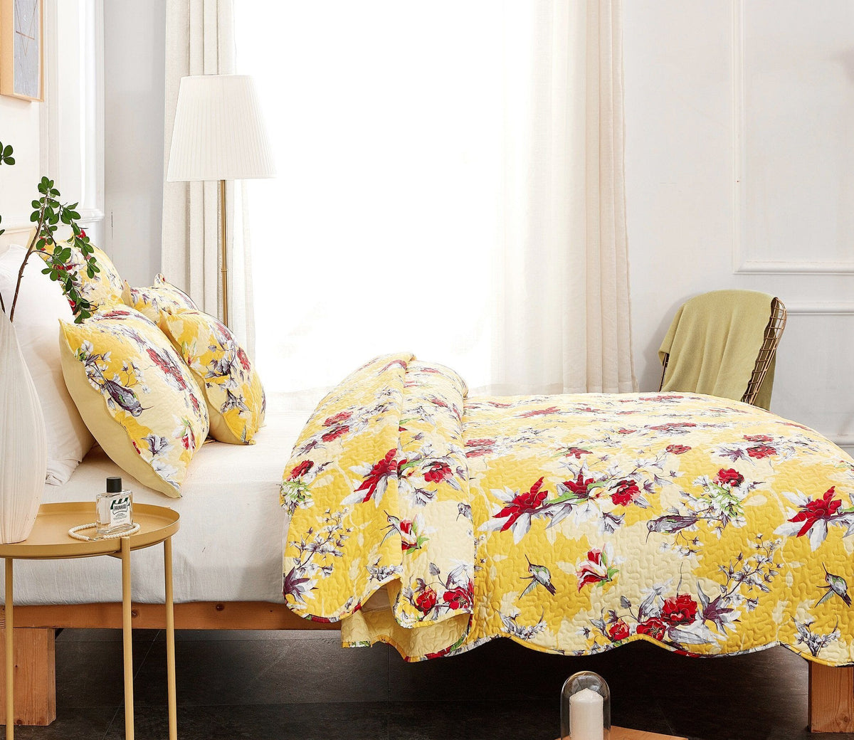 Vibrant yellow hummingbirds and floral scalloped quilted bedspread set.