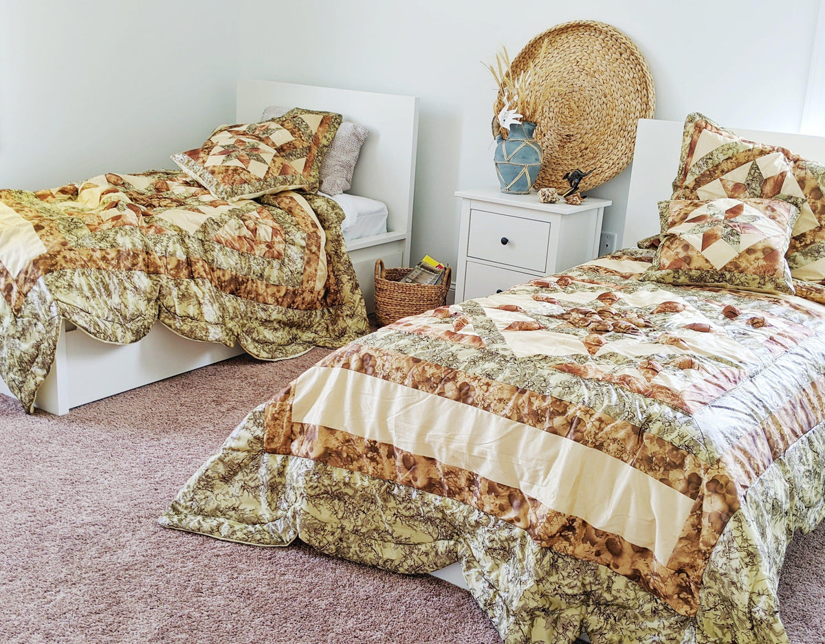 Rustic camouflage and earthy floral beige and green comforter set.