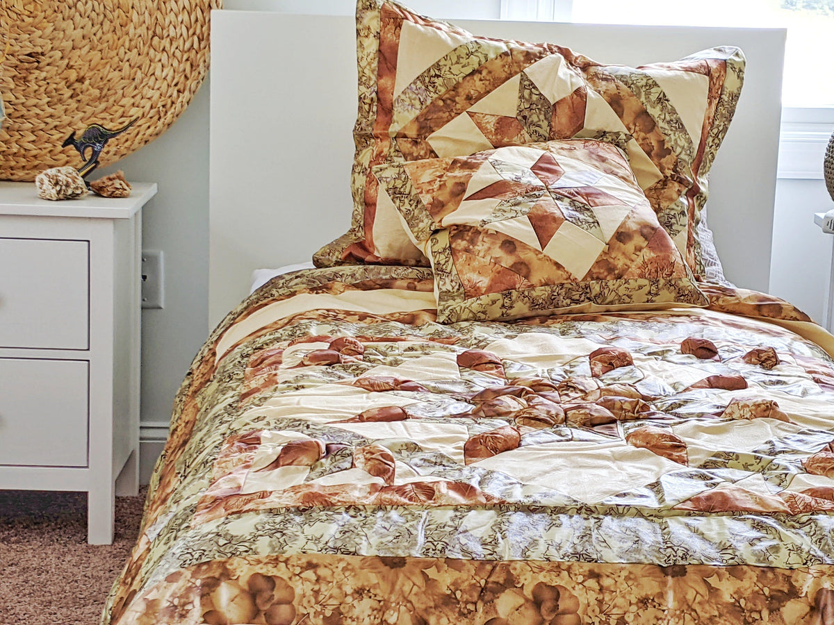 Rustic camouflage earthy floral beige green comforter set with matching shams.