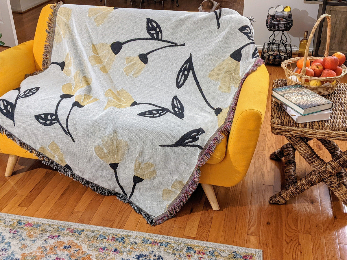 Yellow floral tapestry throw blanket 50x60 with golden botanical pattern.
