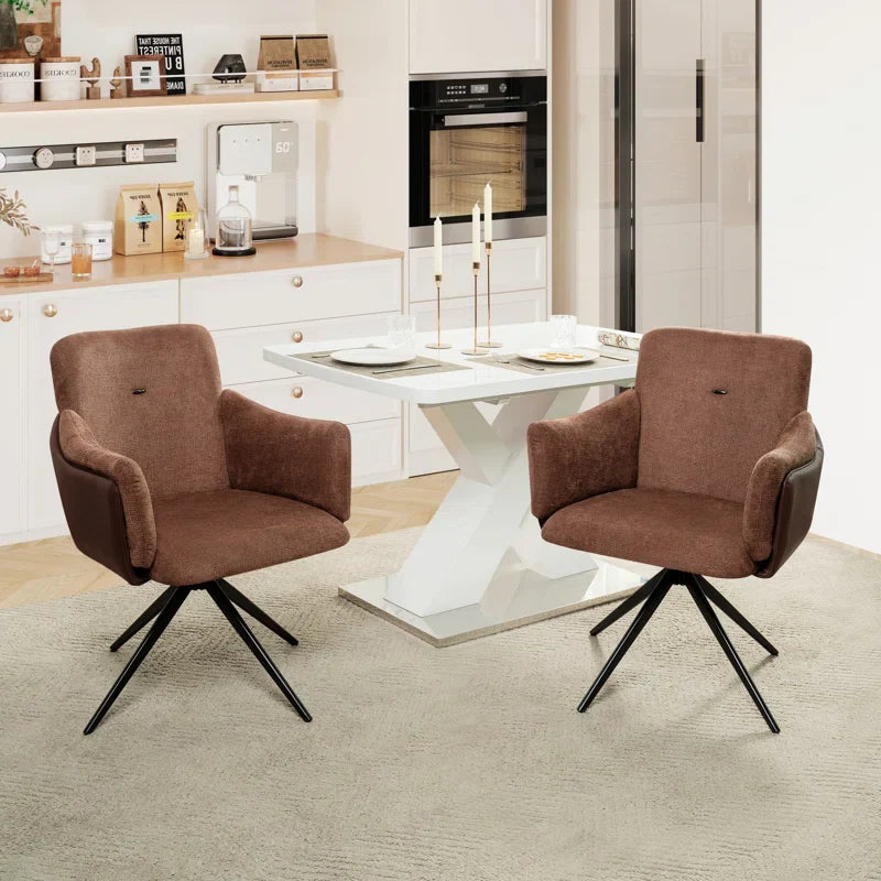 Two dark brown modern swivel office chairs with wheels.