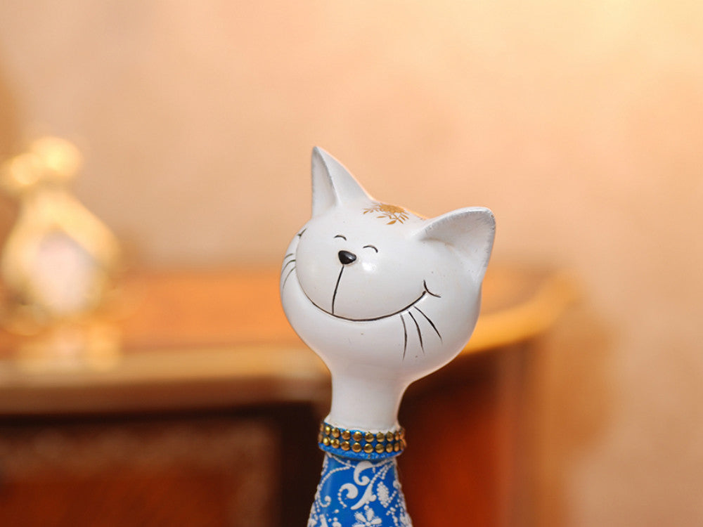 Two hand-painted blue happy cat resin sculptures, tabletop decor.