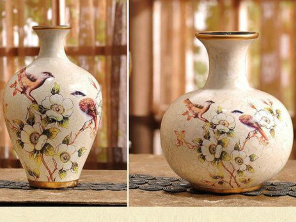 Sunbird Meadow hand-painted ceramic vase set with floral and bird designs.