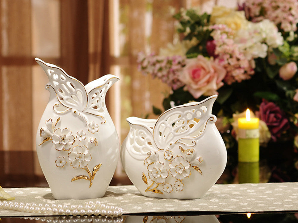 Set of 2 porcelain vases, basket weave texture, pinched flowers, gold accents.