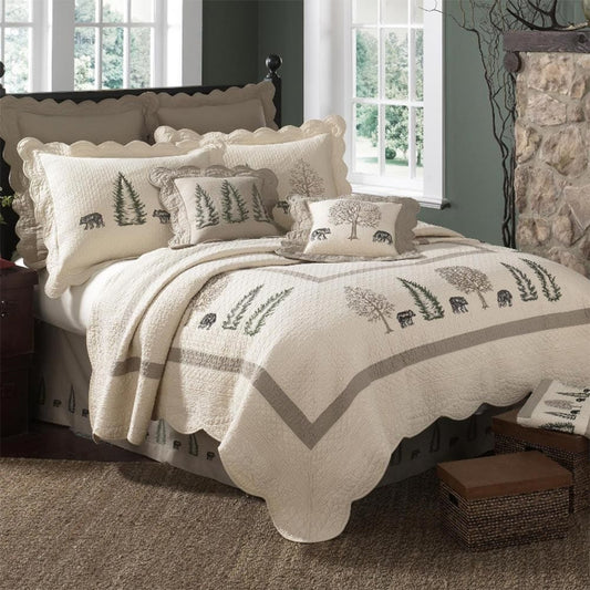 Cozy Bear Creek Quilt Set features embroidered bears and trees, perfect for a rustic bedroom aesthetic.
