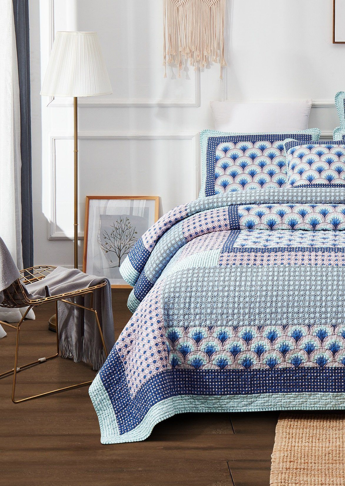 Blue and green Mediterranean patchwork quilted bedspread set.