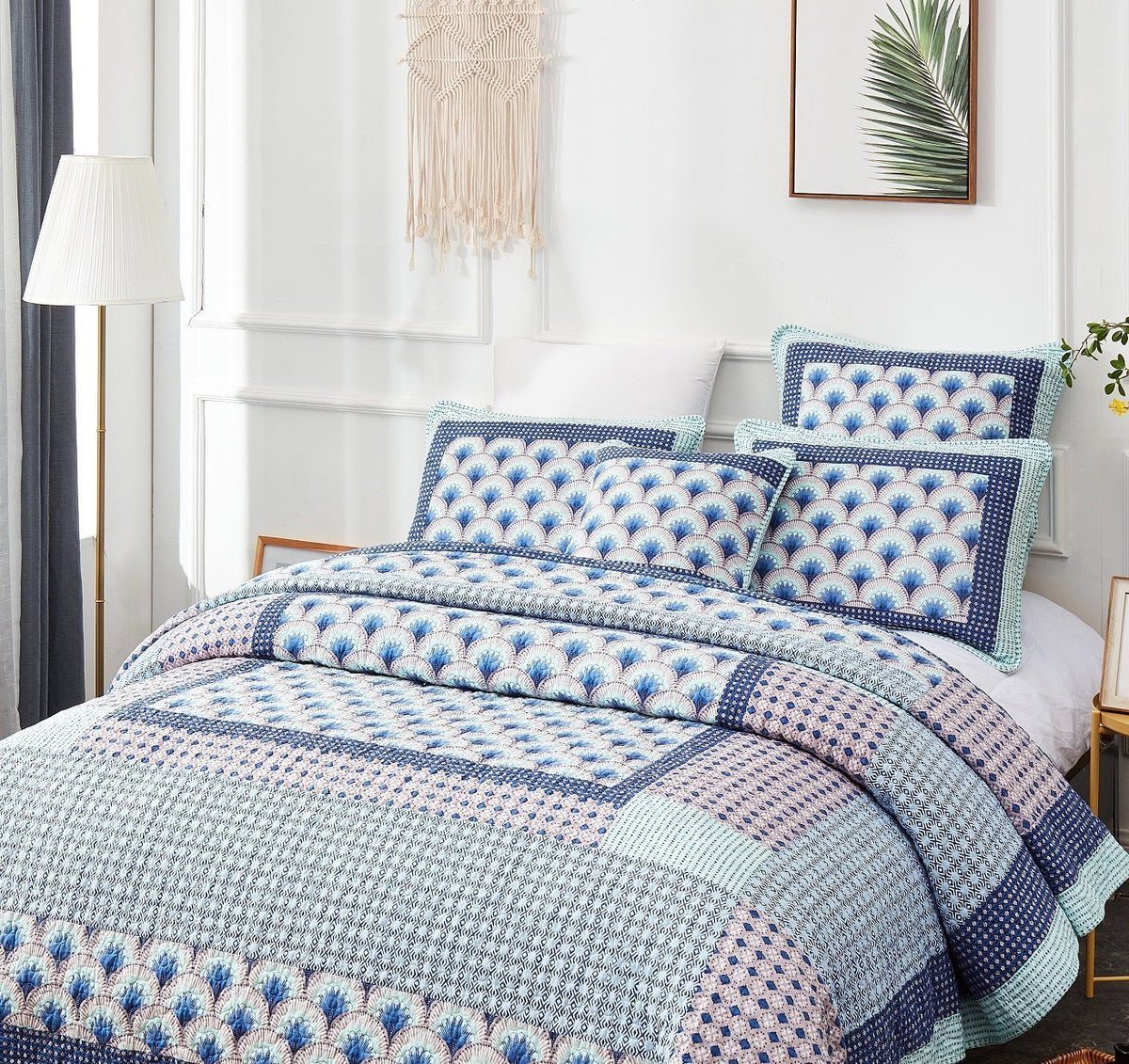 Blue and green Mediterranean patchwork quilted bedspread set.