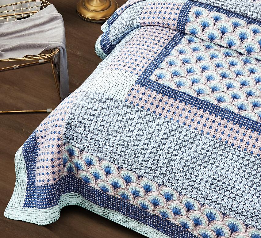 Blue and green Mediterranean patchwork quilted bedspread set.