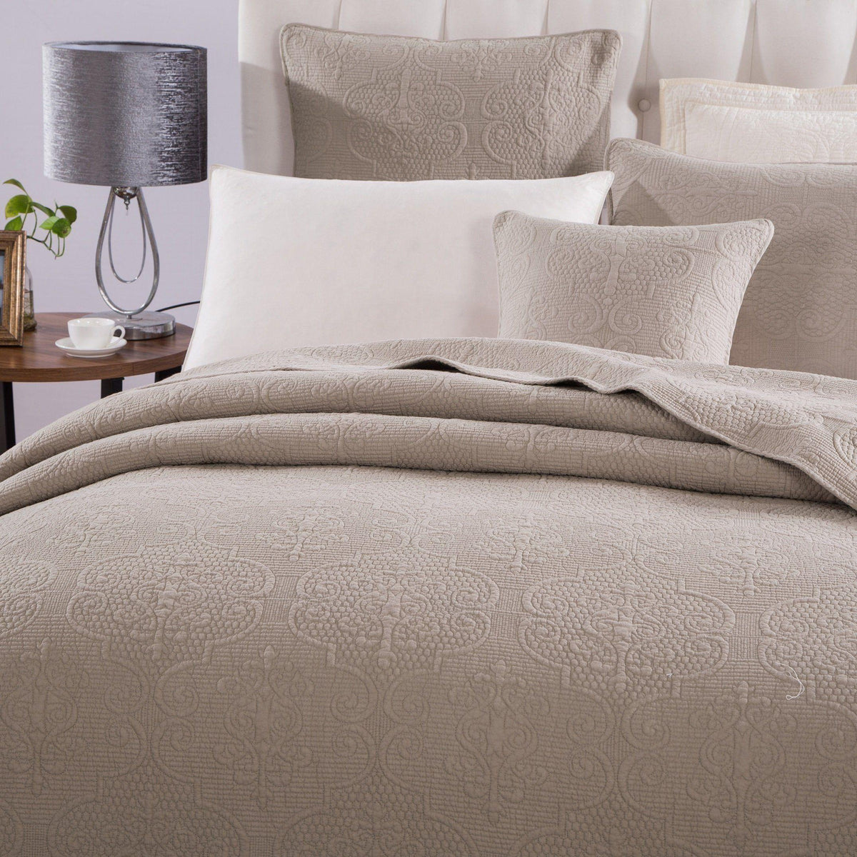 Elegant taupe beige matelasse cotton quilted bedspread set detail.