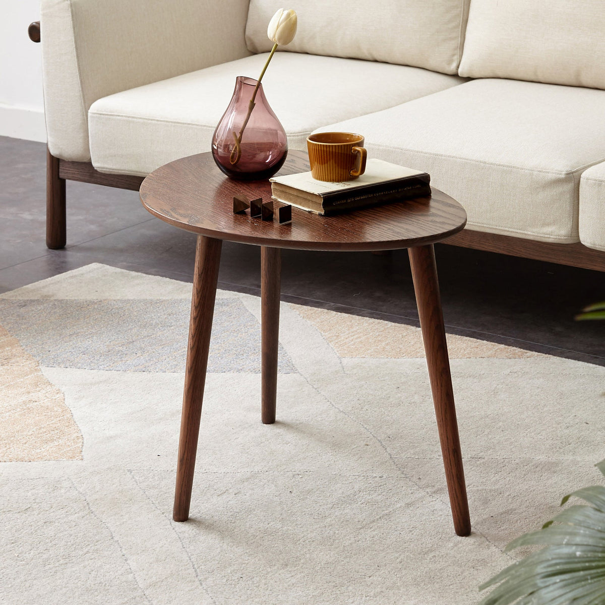 Solid oak mid-century modern oval side table.