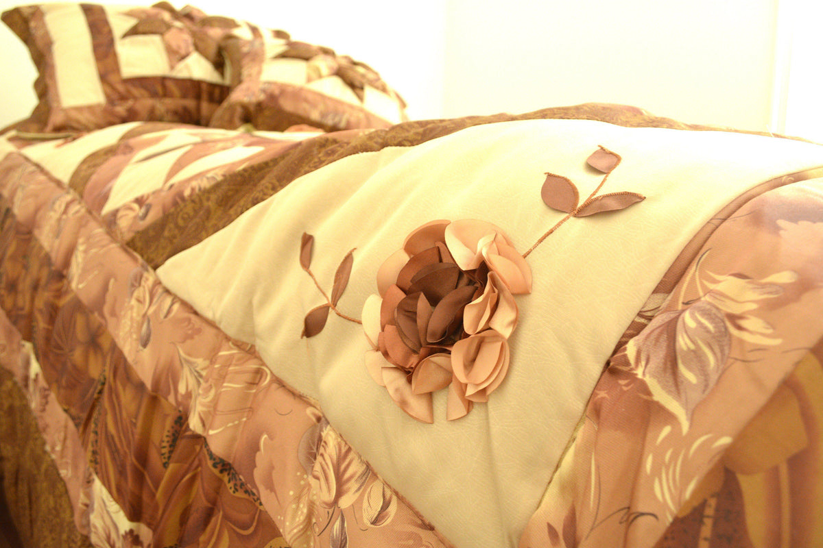 Brown and beige floral star comforter set with ruffles.