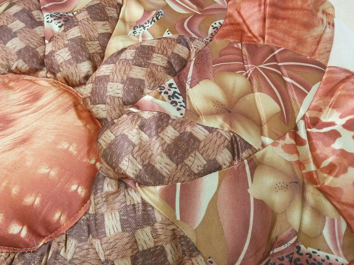 Bronze comforter set with warm floral autumn leaves pattern.
