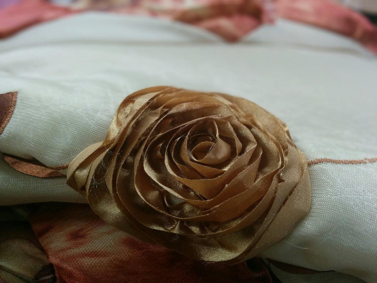 Bronze comforter set with warm floral autumn leaves pattern.