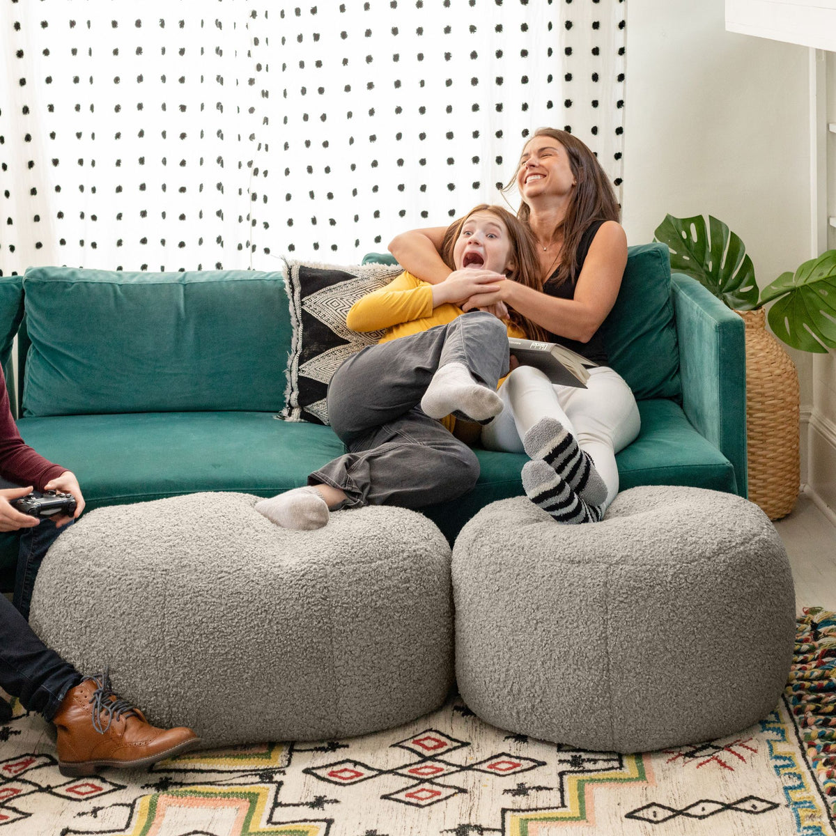 Oval smoke faux lamb shearling ottoman pouf by Jaxx Ellis