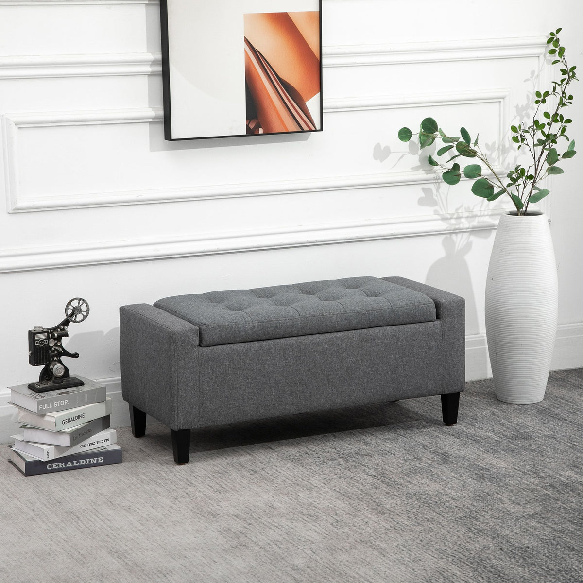 Gray linen storage ottoman with lift-top and space-saving design.