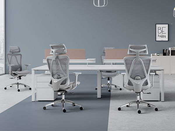 Ergonomic mesh office chair with adjustable headrest, lumbar support, and padded seat.