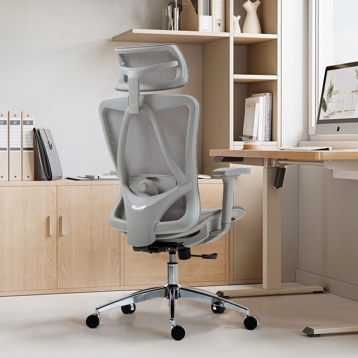 Ergonomic office chair with adjustable headrest, lumbar support, and padded seat.