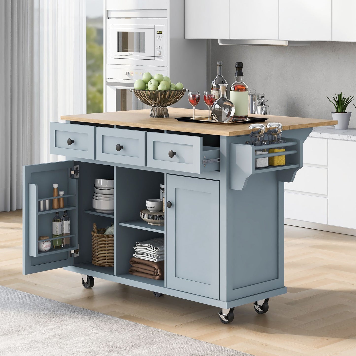 Kitchen cart with drop-leaf rubber wood countertop and 5 wheels with cabinet drawers.