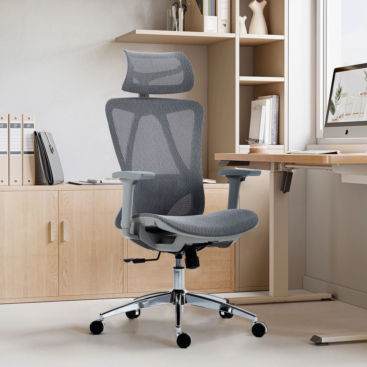Black ergonomic mesh office chair with adjustable headrest and lumbar support