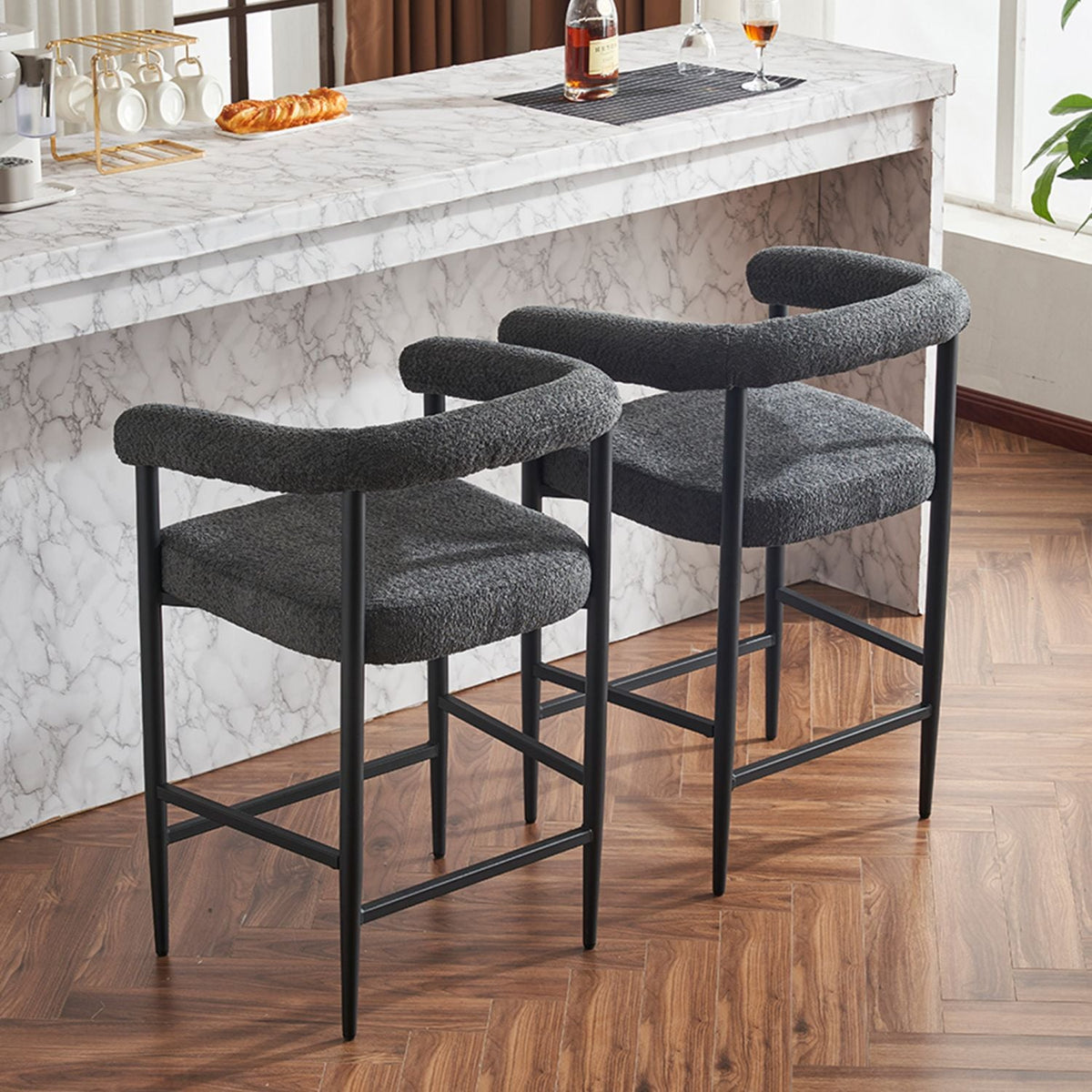 Set of 2 modern boucle upholstered counter height bar stools.