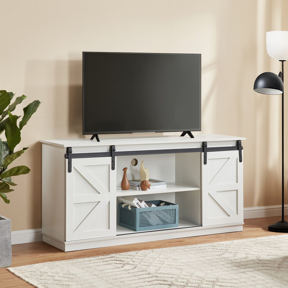 White 58-inch farmhouse TV stand with sliding barn doors, entertainment center.