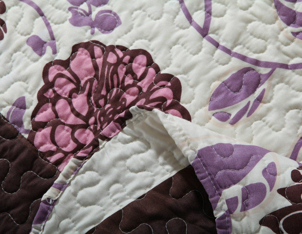 Bohemian floral bedspread set with purple blooms, pink, and brown accents.