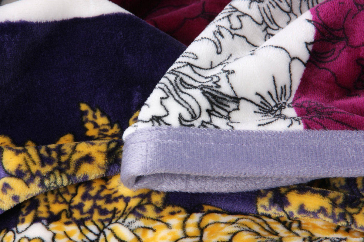 Mink flannel fleece throw blanket with floral striped carnation pattern.