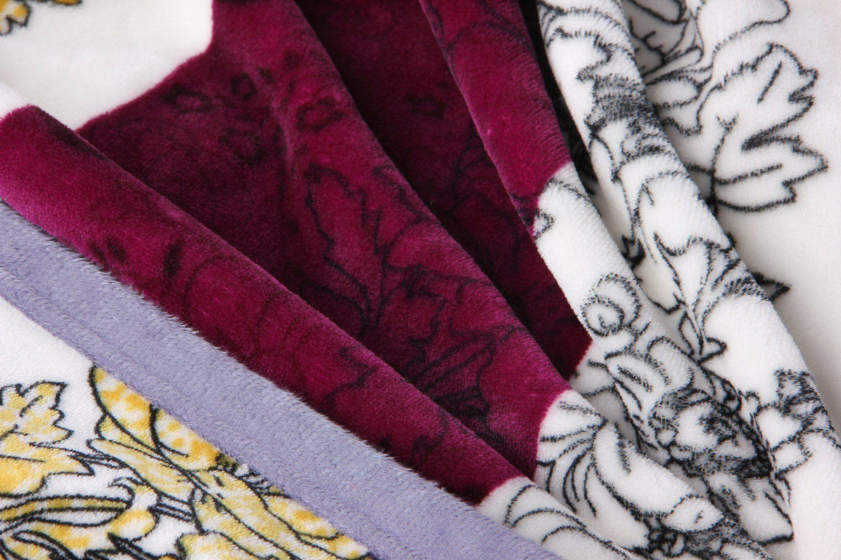 Mink flannel fleece throw blanket with floral and striped carnation pattern.