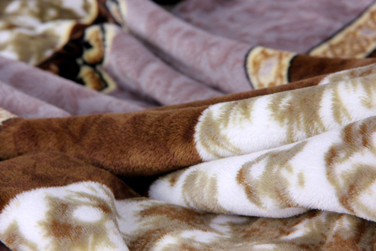 Soft lavender, brown, and cream floral flannel mink fleece throw blanket