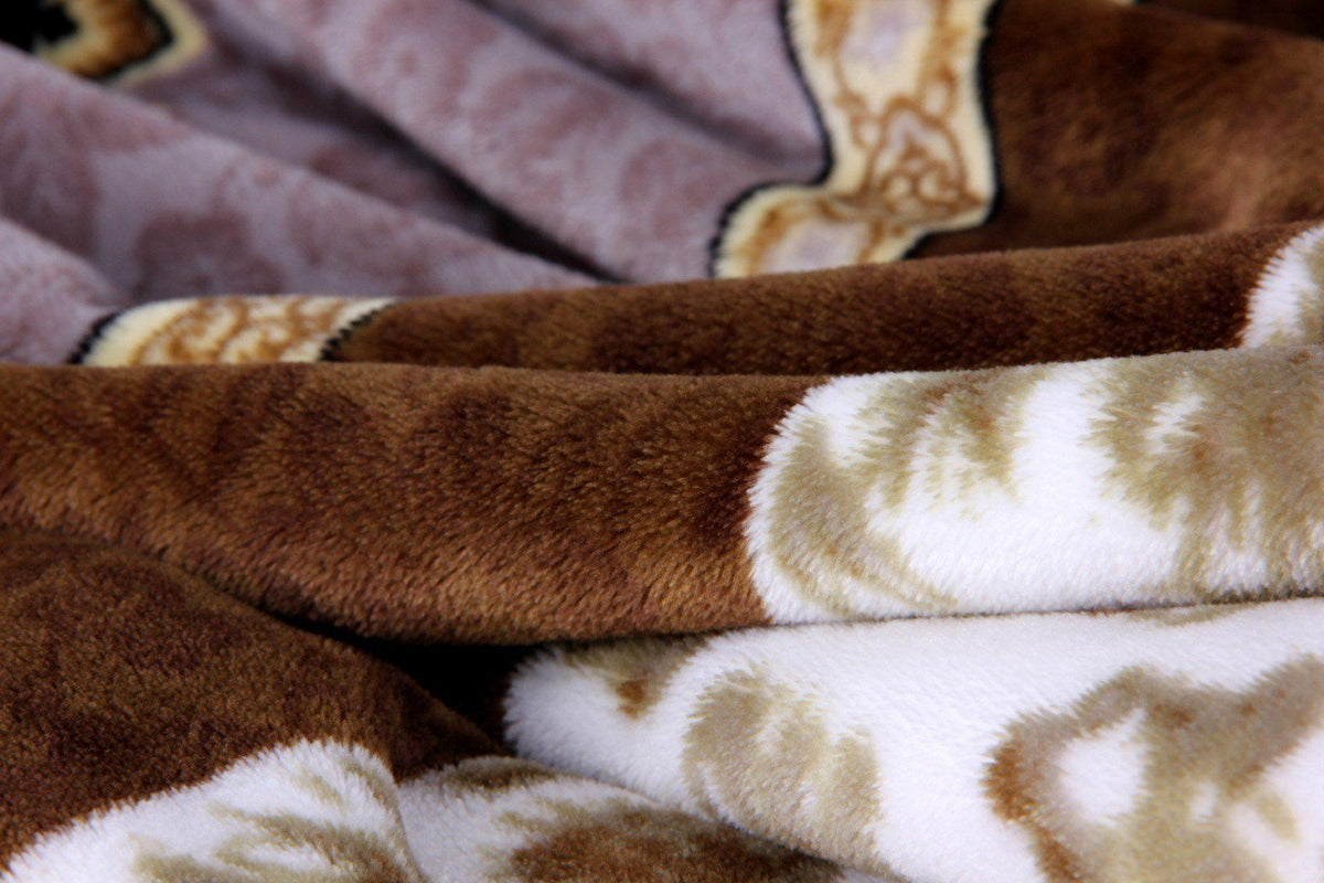 Cozy floral flannel mink fleece throw blanket in twilight lavender and brown.